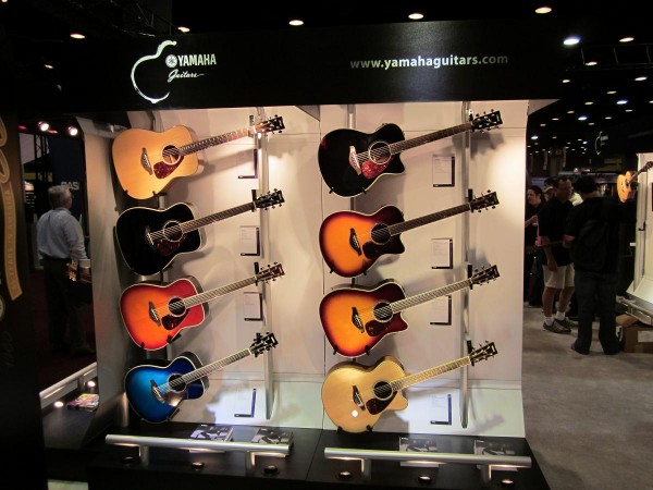 Stacks of Yamaha Acoustic Guitars