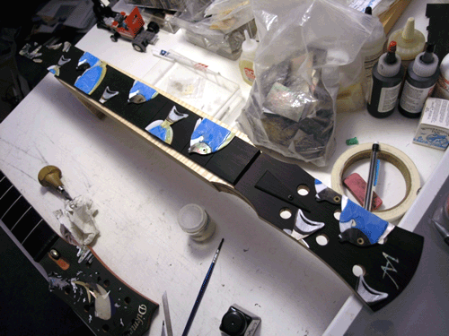 Full fingerboard cutouts