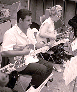 Wrecking Crew members Tommy Tedesco and Carol Kaye in the studio