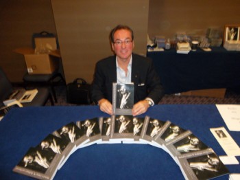Michael A. Cimino with copies of his new Joey Molland biography
