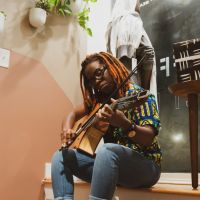 Rising Star Yasmin Williams Talks About Her Music, Guitar Lap Tapping and Patience!