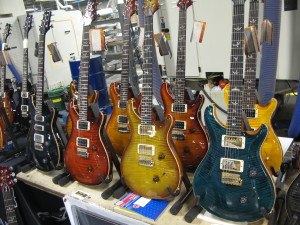  A herd of PRS Guitars - photo credit: Rick Landers